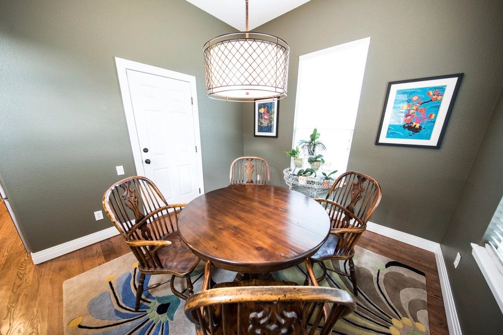 Dining room with hardwood flooring